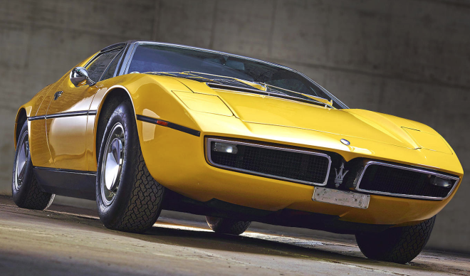 The front end of a Yellow Maserati Bora
