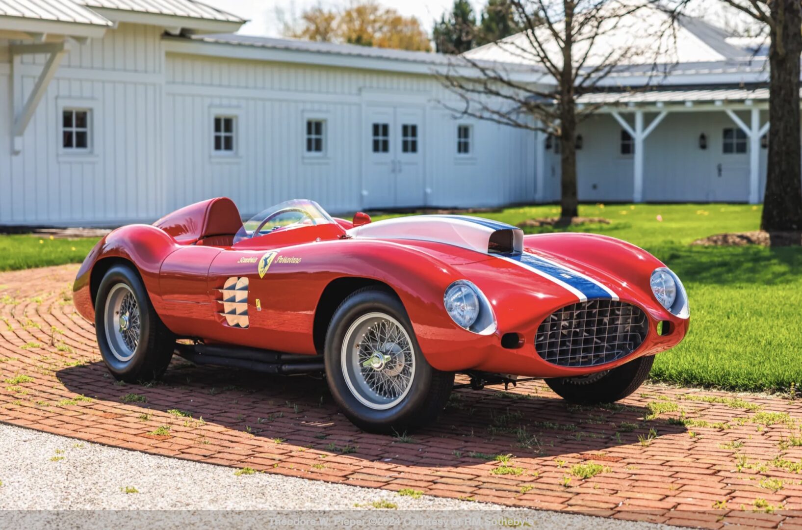 Red 1955 Ferrari 410 Sport Spider right front