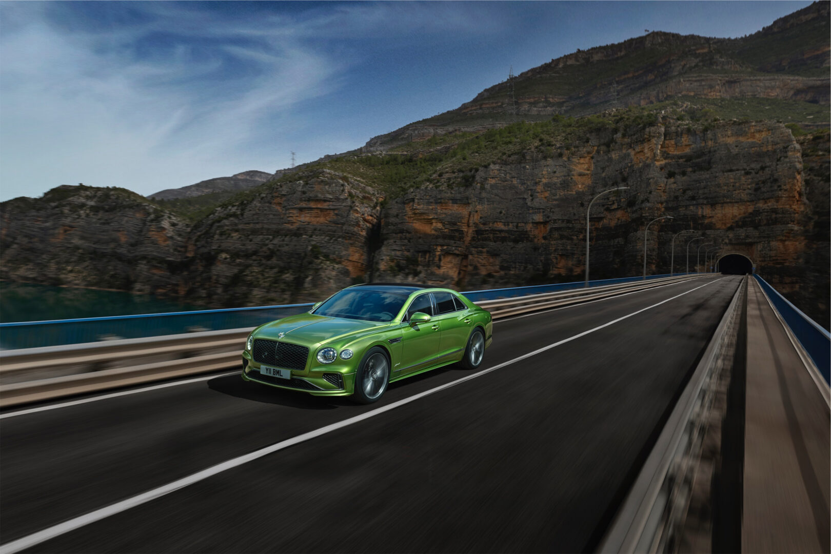 Green 2025 Bentley Flying Spur on road