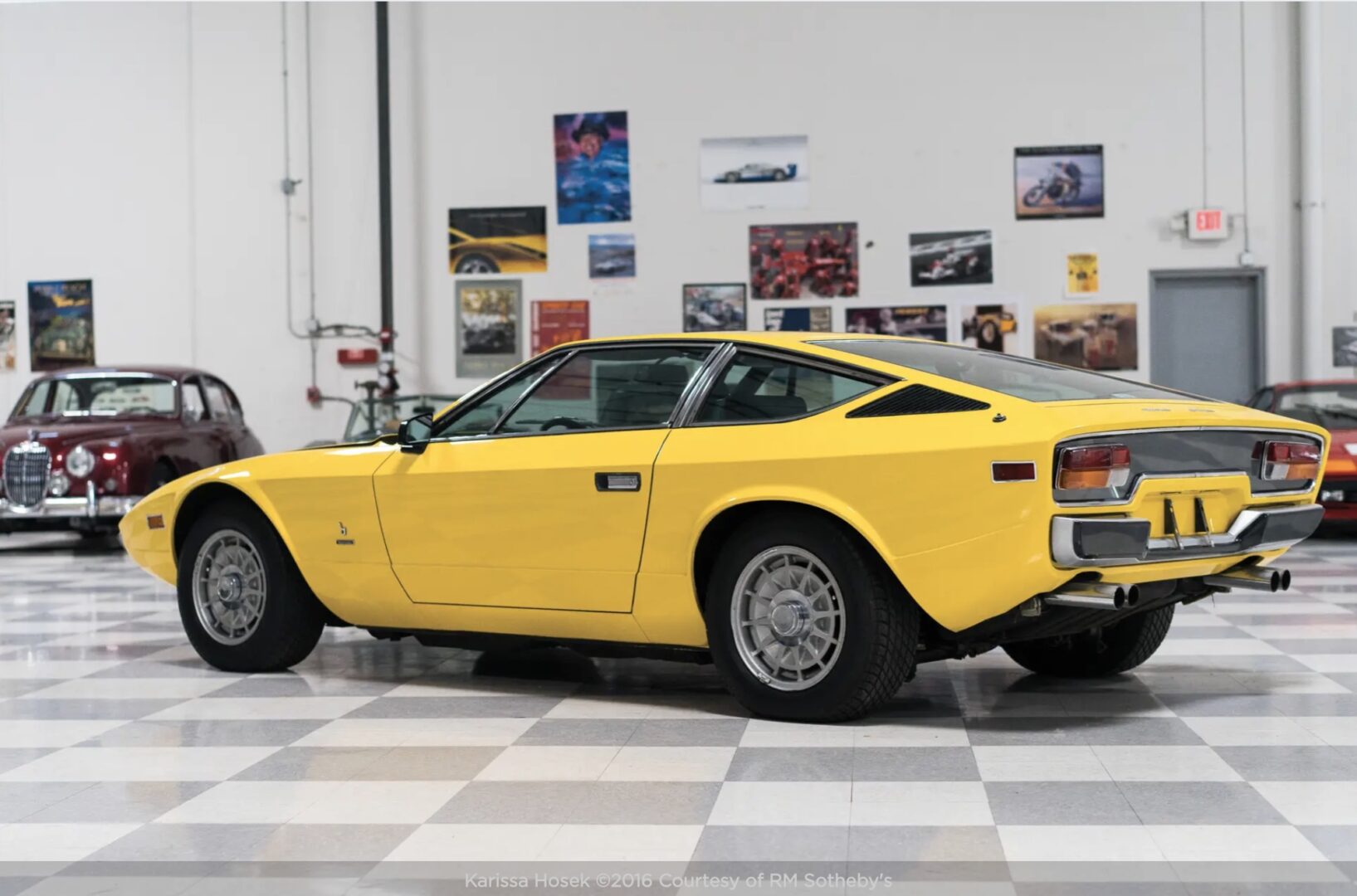 Yellow Maserati Khamsin rear three-quarter view