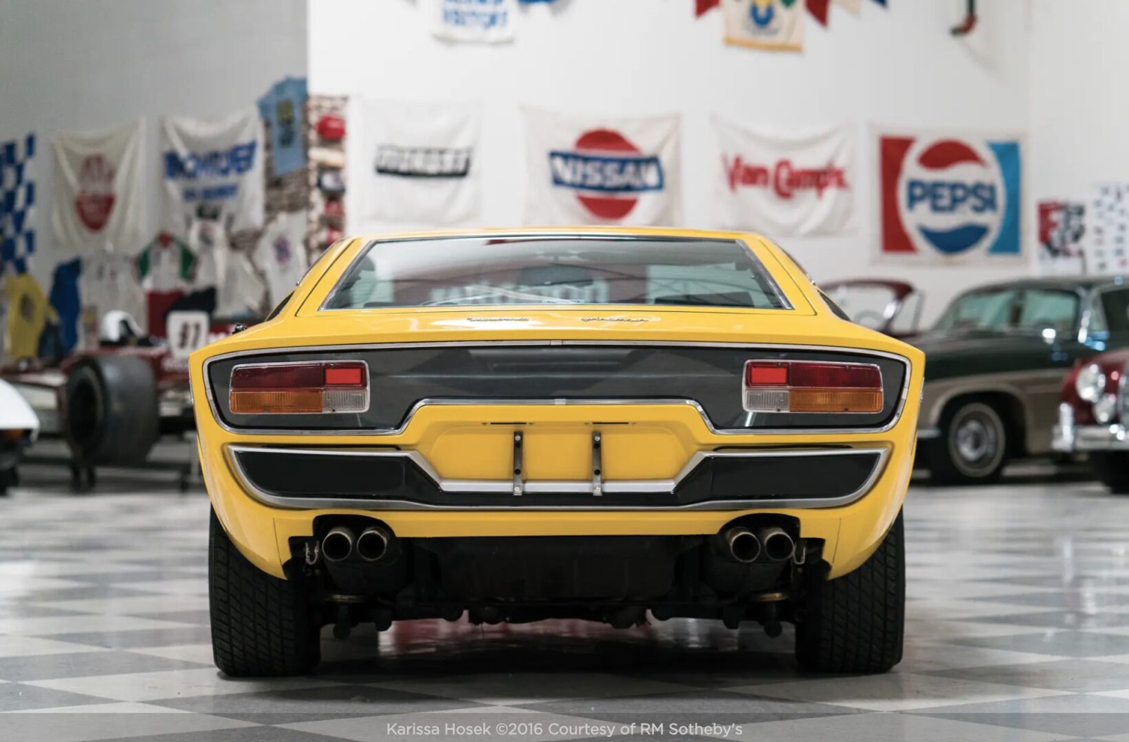 Yellow Maserati Khamsin rear view