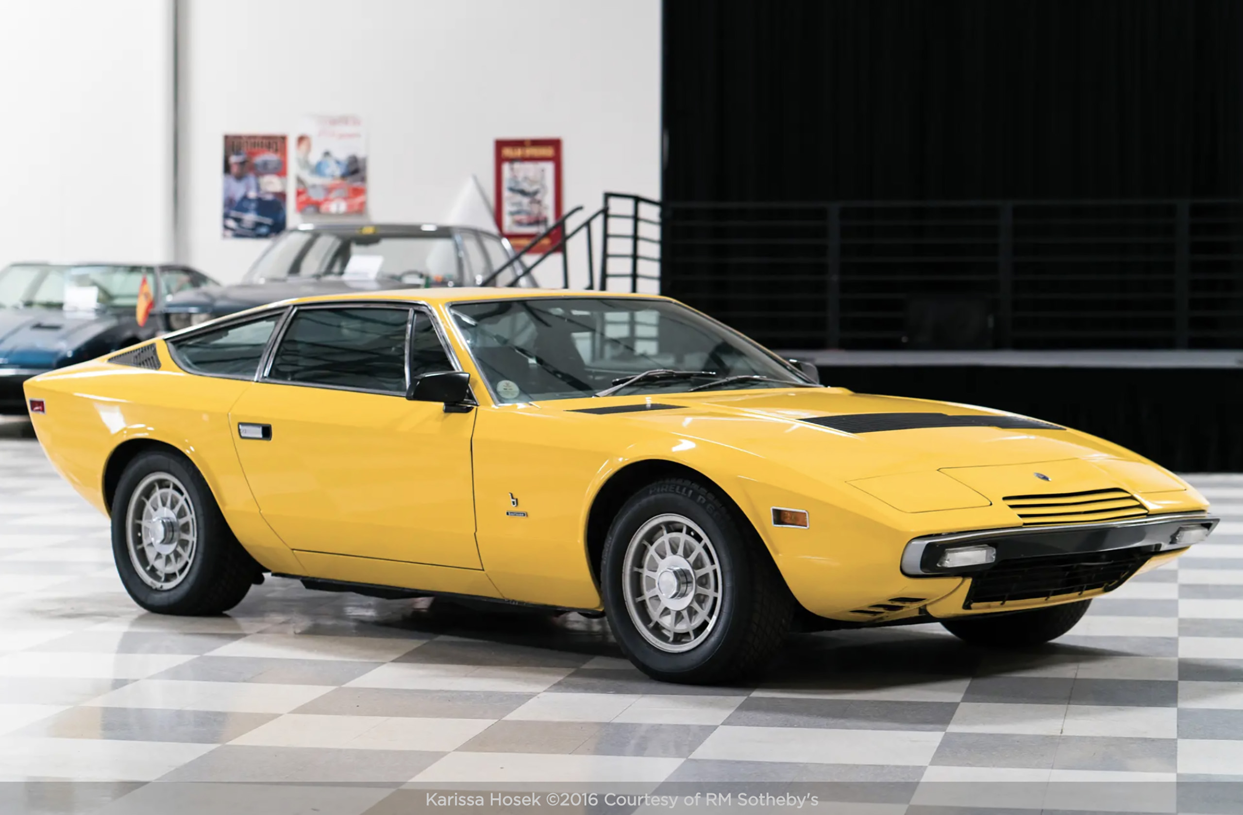 Yellow Maserati Khamsin front three-quarter view