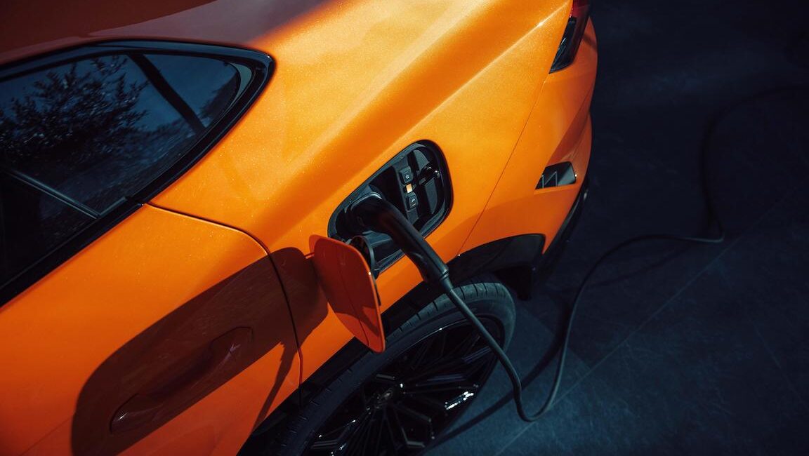 Orange Lamborghini Urus charge port