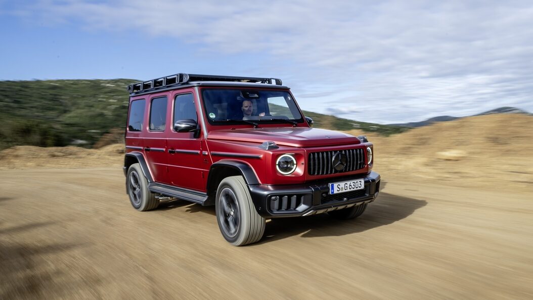 Red 2025 Mercedes AMG G-Class on trail