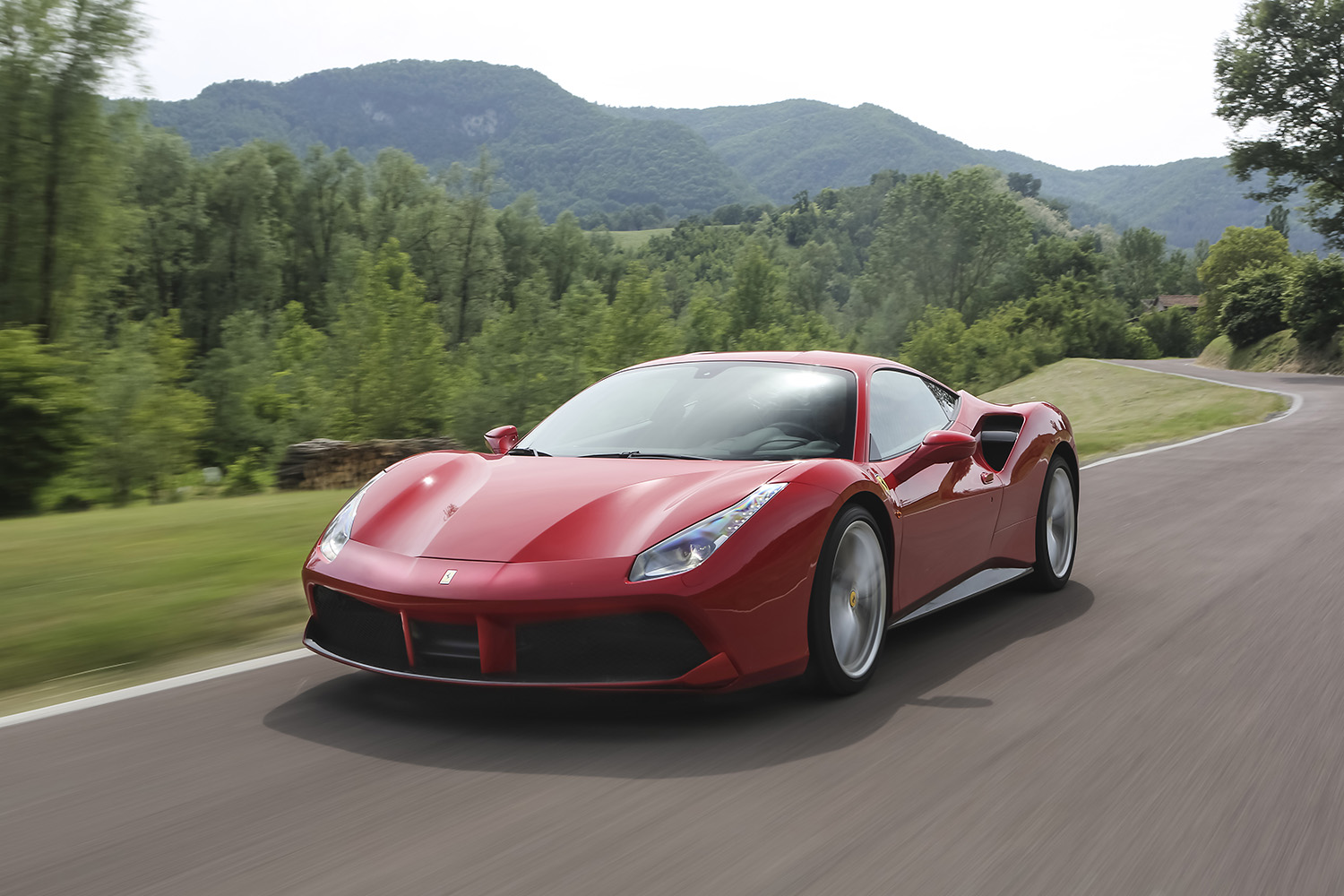 Red Ferrari 488 GTB on road