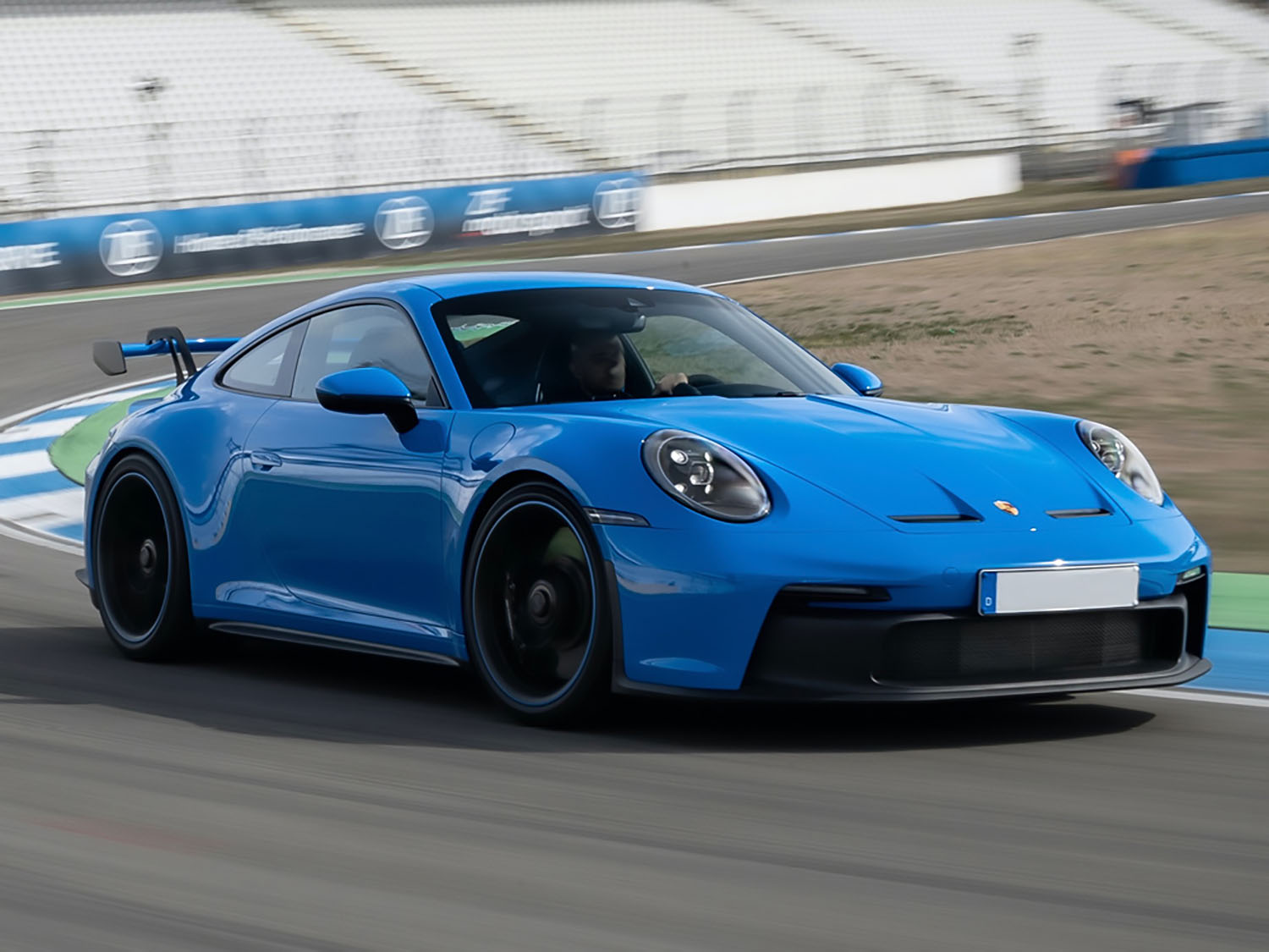 Blue Porsche 911 GT3 on track