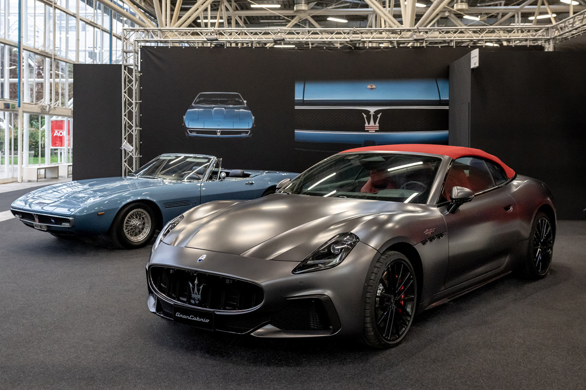 Maserati GranCabrio (right) and a classic Ghibli Spider in auto show display