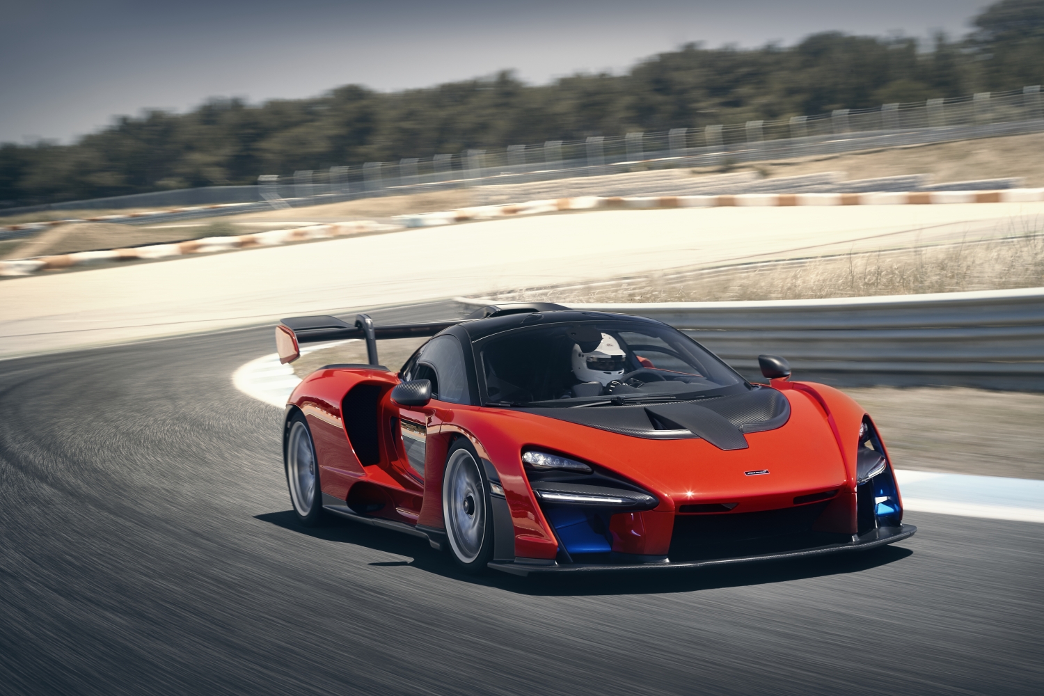 Orange McLaren Senna on racetrack