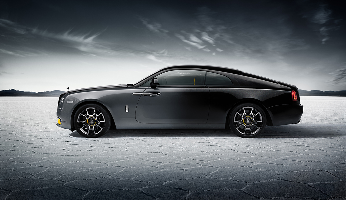 Gray/black Rolls-Royce Wraith coupe, left side profile